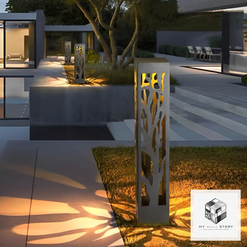 MY WALL STORY Hollow Leaf Solar Lawn Light installed in a modern outdoor garden